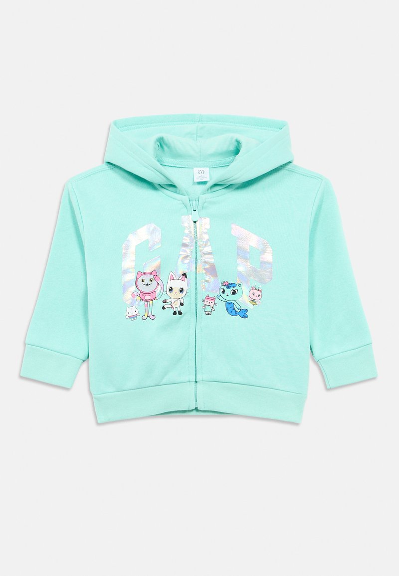 Mäta zelená mikina na zips s klokankovým vreckom a manžetami na rebrovanie. Ozdobená farebnými kreslenými postavičkami a reflexným nápisom "GAP".
