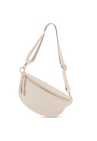 Beżowa torba na ramię w miękkim materiale, o zaokrąglonym kształcie, z górnym suwakiem oraz frędzelkiem, regulowanym paskiem z logo marki. Złote akcenty.