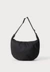 CORE SLING BAG UNISEX - Borsa a tracolla - black