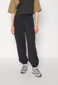 Jordan PANT - Pantalones deportivos - black