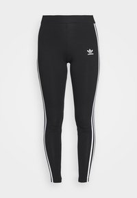 Svarta sportleggings med hög midja, med vita sidostreck och en liten vit logotyp fram. Slät, elastisk offici.