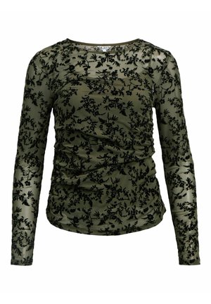Olijfgroene langemouwtop van doorschijnend materiaal, met zwarte bloemenborduursels en geplooide details aan de zijkanten. Ronde halslijn.