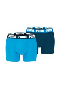 Zwei Paar Boxershorts: eines in leuchtendem Blau und eines in dunklem Marineblau, beide mit breitem elastischem Bund, der das Puma-Logo in Weiß zeigt.