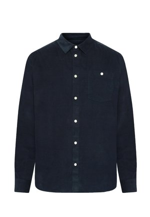 Donkerblauw corduroy overhemd met lange mouwen, witte drukknoopjes en een borstzak op een witte achtergrond.