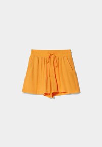 Pantalones cortos de lino amarillos con cintura elástica y cordón, que cuentan con bolsillos laterales y un ajuste holgado con una tela texturizada.