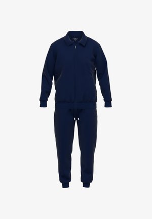 Chándal azul marino hecho de tejido texturizado. La chaqueta tiene un cierre de cremallera frontal, cuello y puños acanalados; los pantalones tienen una cintura ajustable con cordón.