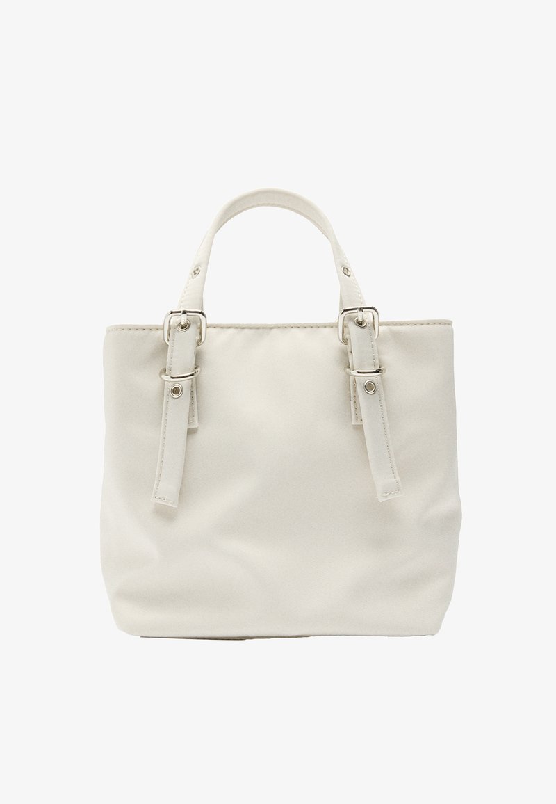 Biała torba typu tote, wykonana z gładkiego materiału, z dwoma regulowanymi paskami, prostokątnym kształtem oraz przeszyciami.