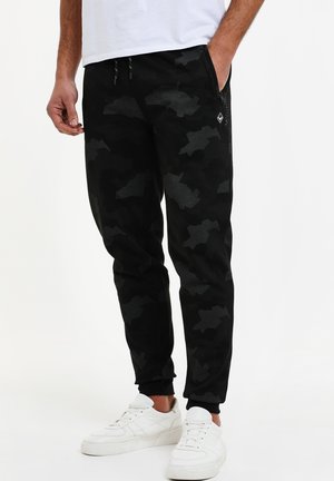 THBJEREMY - Tracksuit bottoms - charcoal camo