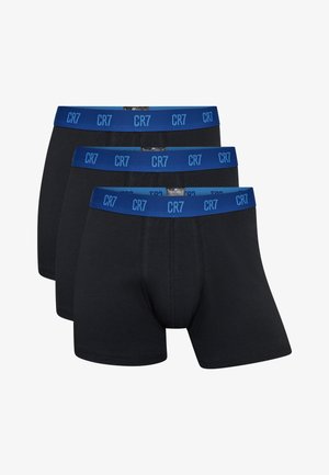 Black cotton boxers with blue elastic waistband featuring “CR7” logo; includes three pairs, smooth texture, and standard fit design.