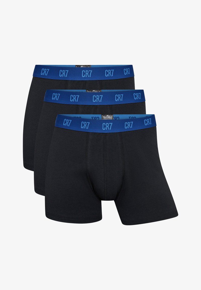 Black cotton boxers with blue elastic waistband featuring “CR7” logo; includes three pairs, smooth texture, and standard fit design.