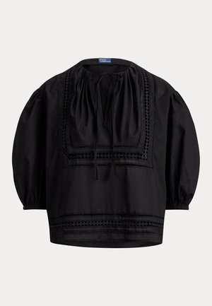 Schwarze lockere Bluse mit Ballonärmeln, quadratischem Ausschnitt, vorderer Bindung und besticktem geometrischem Rand an Brust und Saum.