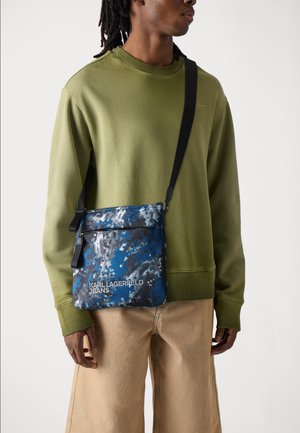 ESSENTIAL - Cross body bag - blue