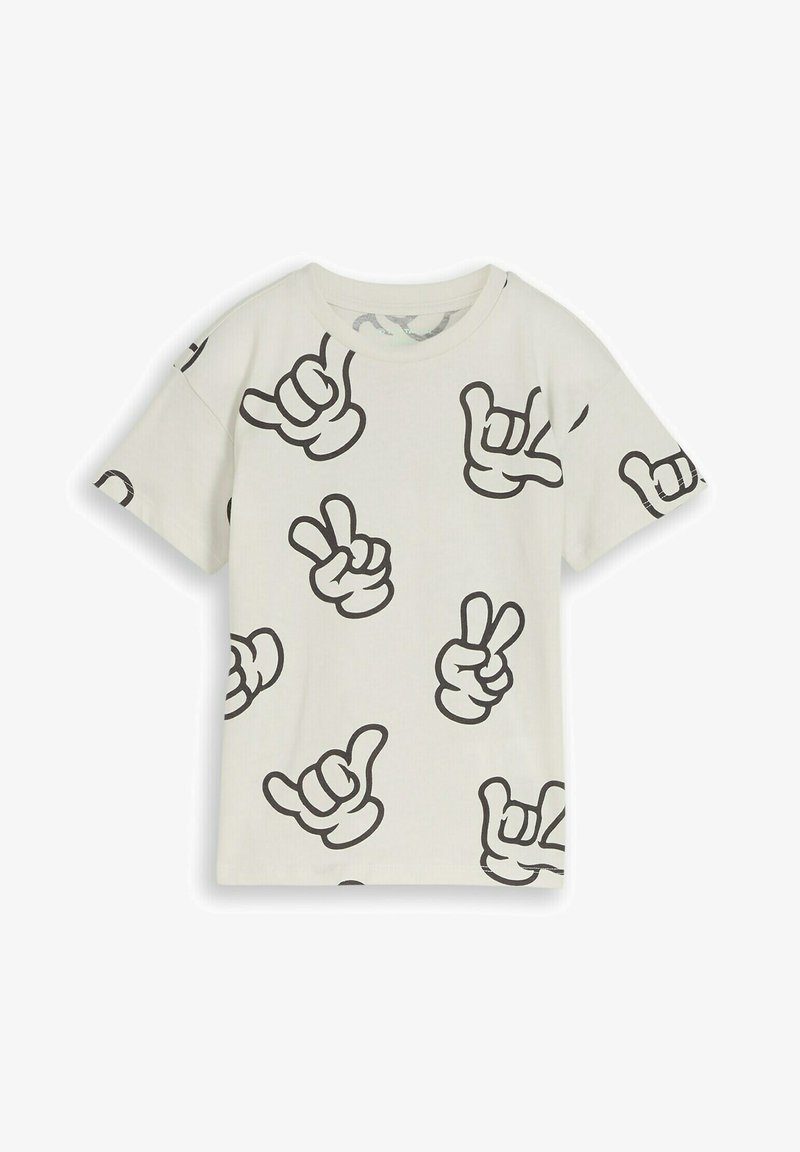T-shirt blanc à manches courtes avec des graphismes de mains dessinées en noir montrant les signes de paix et shaka, dispersés sur le tissu.