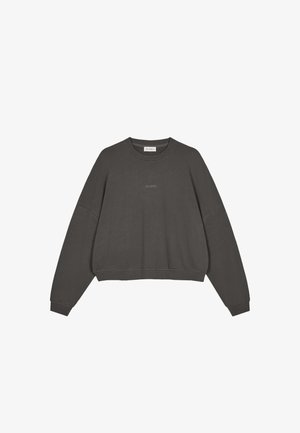 Donkergrijze cropped sweatshirt met verlaagde schouders, ronde hals en een subtiel logo aan de voorkant. Gemaakt van zacht katoenen stof.