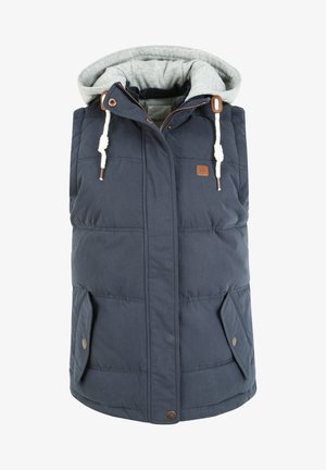 Gilet rembourré bleu marine avec une capuche grise, présentant une fermeture éclair à l'avant, des cordons de serrage à trou et deux poches latérales avec fermetures à pression.