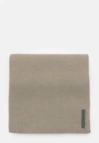 Knitted beige scarf with a textured finish. Features a stitched edge and a small black label with logo detailing.