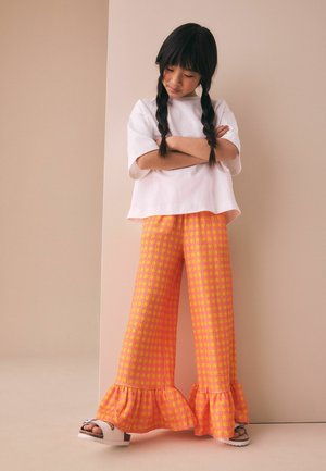 Next, REGULAR FIT - FRILL HEM TEXTURED TROUSERS . - Püksid - pink yellow gingham