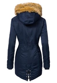 Navy blue parka jacket with a fur-trimmed hood, drawstring waist, and lace-up detail at the hem. Smooth texture, long sleeves.