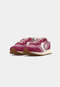 Sport sneakers with a pink and purple upper, white accents, round toe, textured suede, and a rugged brown rubber sole.