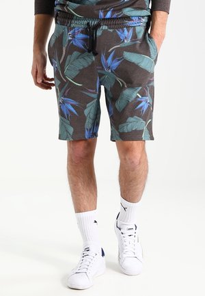 Korte shorts i bomuldsblanding med en mørkegrå bund, der har et tropisk blad- og blomstermønster i blå og grøn. Elastisk talje med snor.