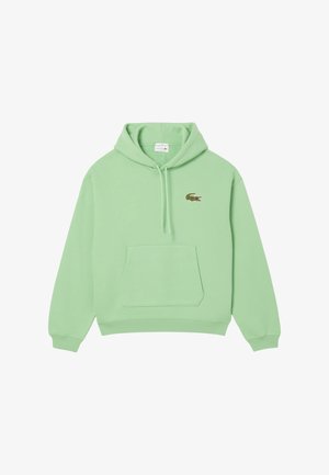 Sweat à capuche vert clair avec poche kangourou devant et petit logo crocodile vert sur la poitrine gauche.
