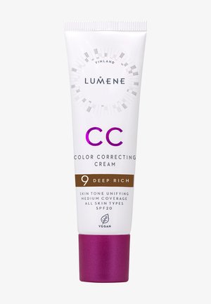 CC color correcting cream in a white tube with a purple base. Features text indicating shade '9 Deep Rich' and SPF 20. Vegan product.