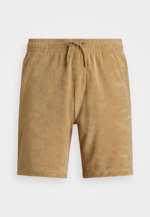 Beige, textured shorts with an elastic waistband and drawstring. Features a front pocket with a subtle, soft finish. Mid-thigh length.