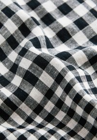 Next Miniseelik - black white