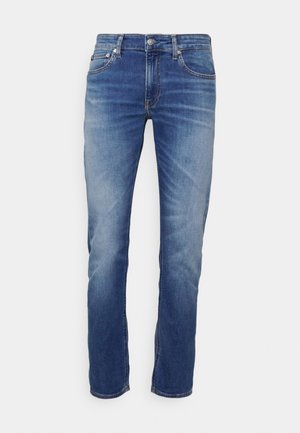 Lichtblauwe spijkerbroek met een rechte pasvorm, gemaakt van denim. Bevat vijf zakken, riemlussen en een ritssluiting met een metalen knoop.
