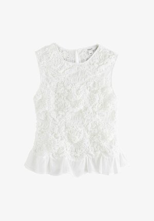 Sleeveless white blouse with textured floral patterns, round neckline, keyhole back, and a ruffled hemline.