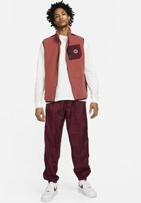 Nike Sportswear Pantaloni sportivi - dark beetroot coconut milk