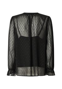 Blusa nera trasparente con motivo a pois geometrici, maniche lunghe, polsini arricciati e design con apertura a chiave sul retro. Tessuto leggero e fluido.