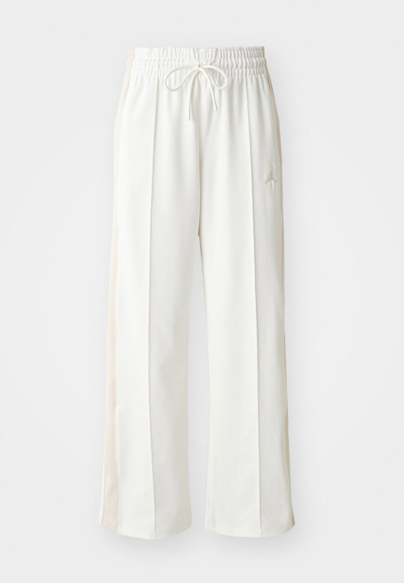 Pantalones de chándal blancos de pierna ancha con cinturilla elástica y cordón, con un sutil panel lateral beige y detalle de logotipo en relieve.