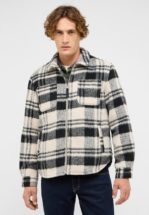 - Kurtka przejściowa