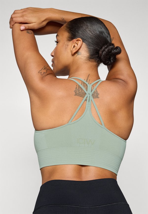 DEFINE SEAMLESS BRA - Medium support sports bra - light moss4
