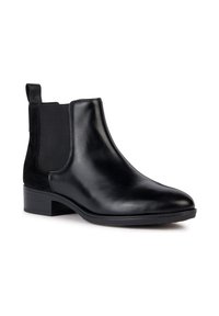 Bottine en cuir noir avec panneaux élastiques sur les côtés, bout rond, talon carré et finition lisse et brillante. Dispose d'une languette à l'arrière pour un enfilage facile.