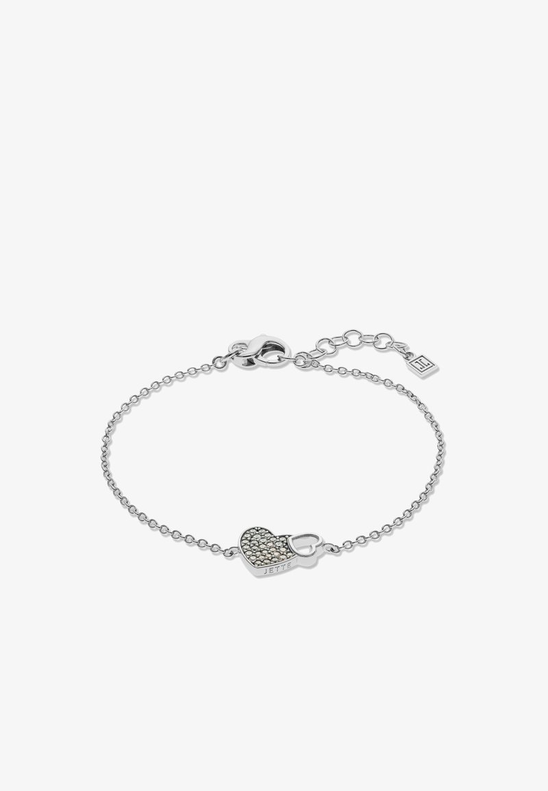 Zilveren armband met een hartvormige hanger, versierd met kleine kristallen en een open hartomtrek, gegraveerd met "JETTE".