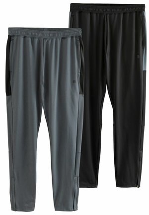 Two pairs of athletic pants: one in dark gray with black accents and one solid black. Both feature an elastic waistband and thin fabric.