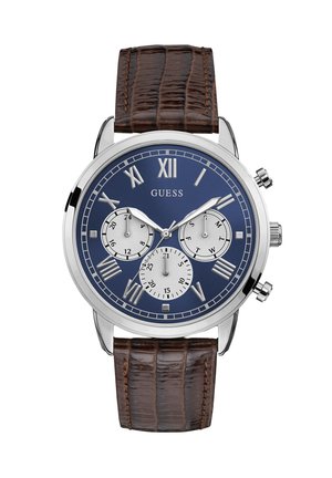 Chronografický hodinky s modrým ciferníkom, striebornými rímskymi číslicami a tromi subciferníkmi. Hnedý kožený remienok s krokodílou potlačou, puzdro z nehrdzavejúcej ocele.