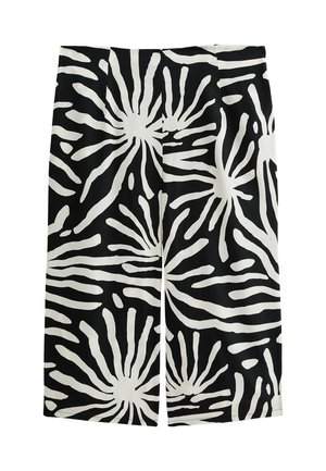 Shorts noirs avec un motif abstrait blanc audacieux et des formes rayonnantes. Fabriqués en tissu lisse, coupe ajustée et design longueur genoux.
