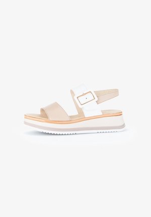 Beige and white platform sandals with a glossy finish, adjustable buckle, and textured sole. Features a subtle layered design.