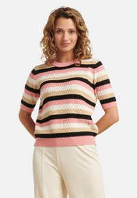 Kurzarmpullover aus Strick in pink, schwarz und creme mit Zickzackstreifen, mit einem gerippten Halsausschnitt und Saum sowie einer strukturierten Oberfläche.