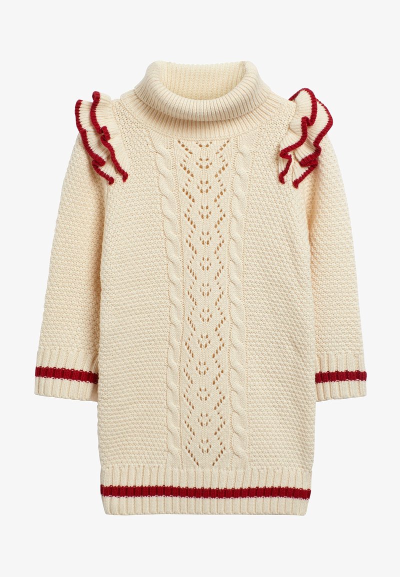 Pull en tricot crème à col roulé avec des motifs en torsades et dentelle, des accents de volants rouges sur les épaules et des rayures rouges sur les poignets et l'ourlet.