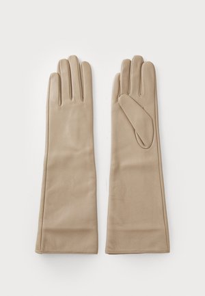 Beige leather gloves with a smooth texture, featuring five finger design and an extended wrist length for a fitted look.