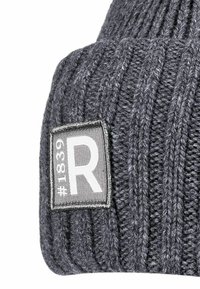 Gray knitted beanie featuring a ribbed texture and a rectangular patch with the letter "R," the number "1839," and a hashtag symbol.