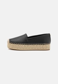 Sorte læder espadrille sko med en vævet jutesål. Glat overflade med en rund tå og en dekorativ stikning.