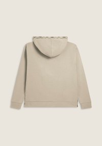 Felpa beige con cappuccio, dal tessuto morbido, caratterizzata da un accento decorativo lungo il cappuccio e cerniere sui lati per le regolazioni.