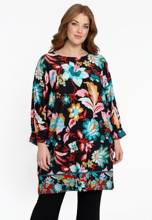 Schwarze Blumentunika mit lebhaften blauen, rosa und gelben Blumen, drei Viertelärmel und lockerer Passform. Geeignet für die Freizeit.