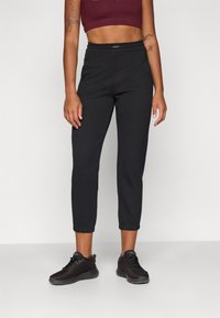 Champion C-TECH CUFFED PANTS INTERLOCK - Joggebukse - black