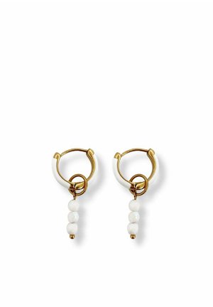 Gold and white hoop earrings with a small ring and three dangling white beads on each hoop against a white background.